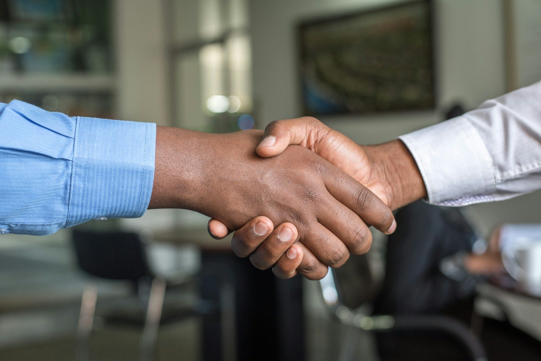 Investors reviewing a term sheet at the table